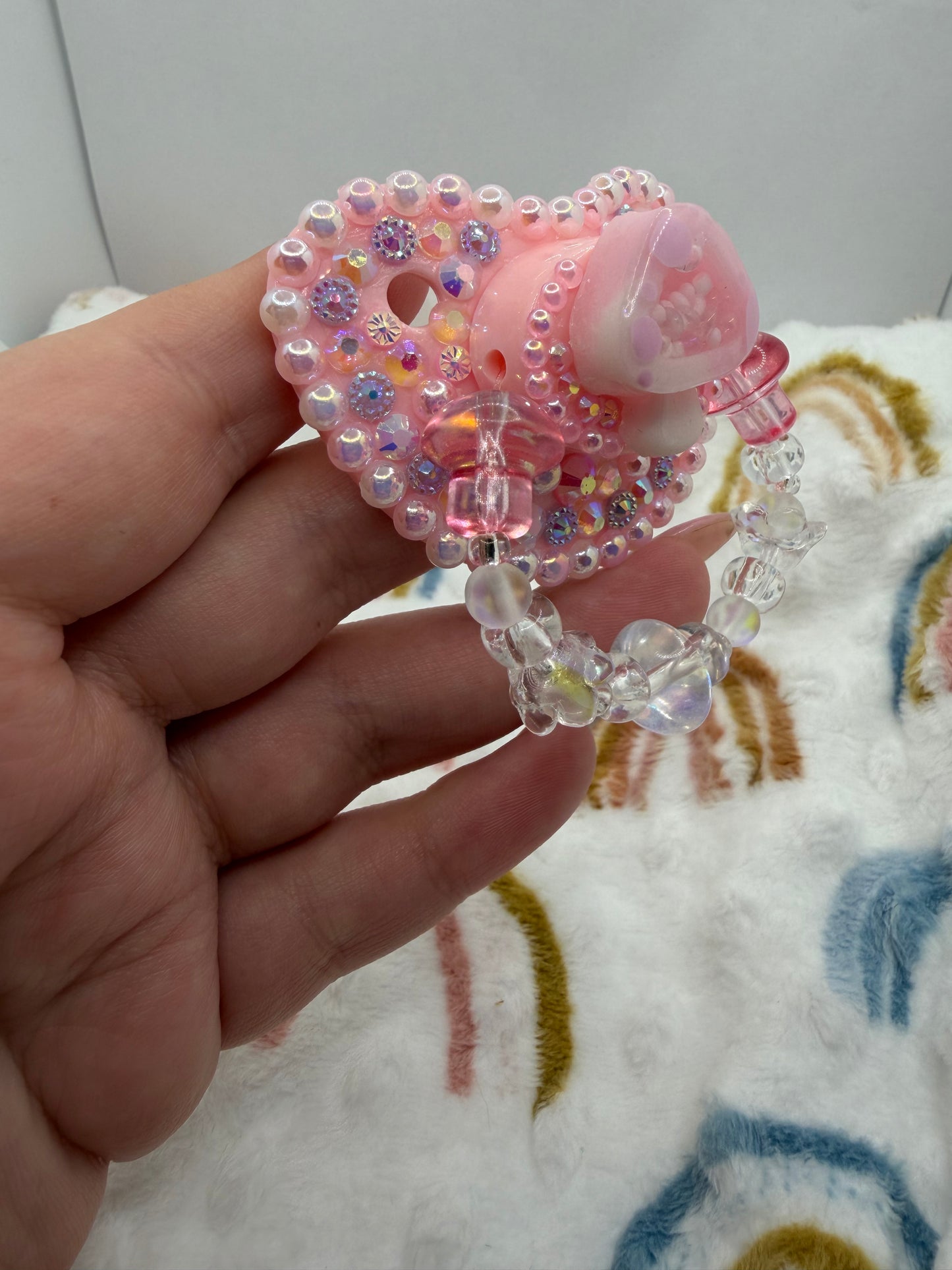 Pink Mushie Shaker Paci (Glass Bead Handle)